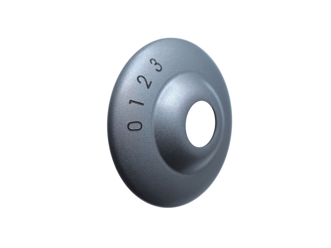 Gravure au laser sur un bouton rotatif en plastique